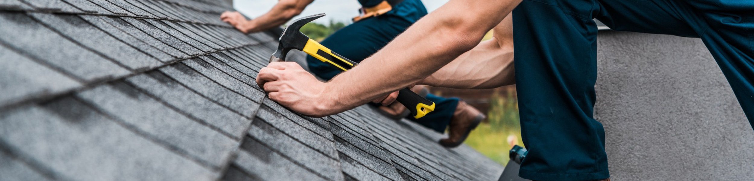 hammering shingle roof